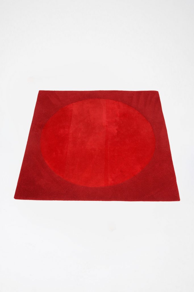 Red Square Rug Texture Red Square Rug With Circular Pattern - The Classic Modern Prop Hire Company